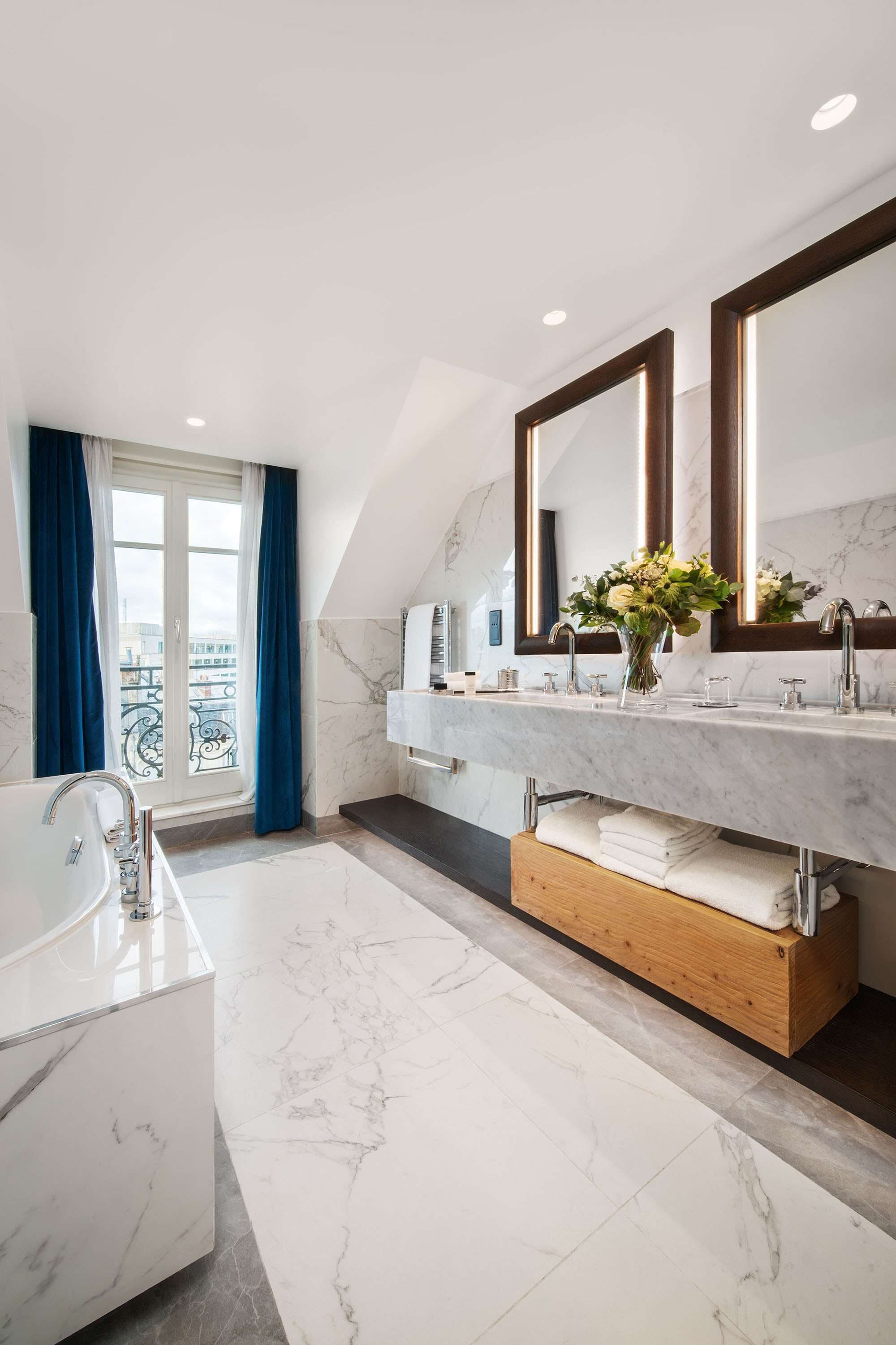eiffel tower suite | bathroom | shower, rainfall showerhead, designer toiletries, hair dryer