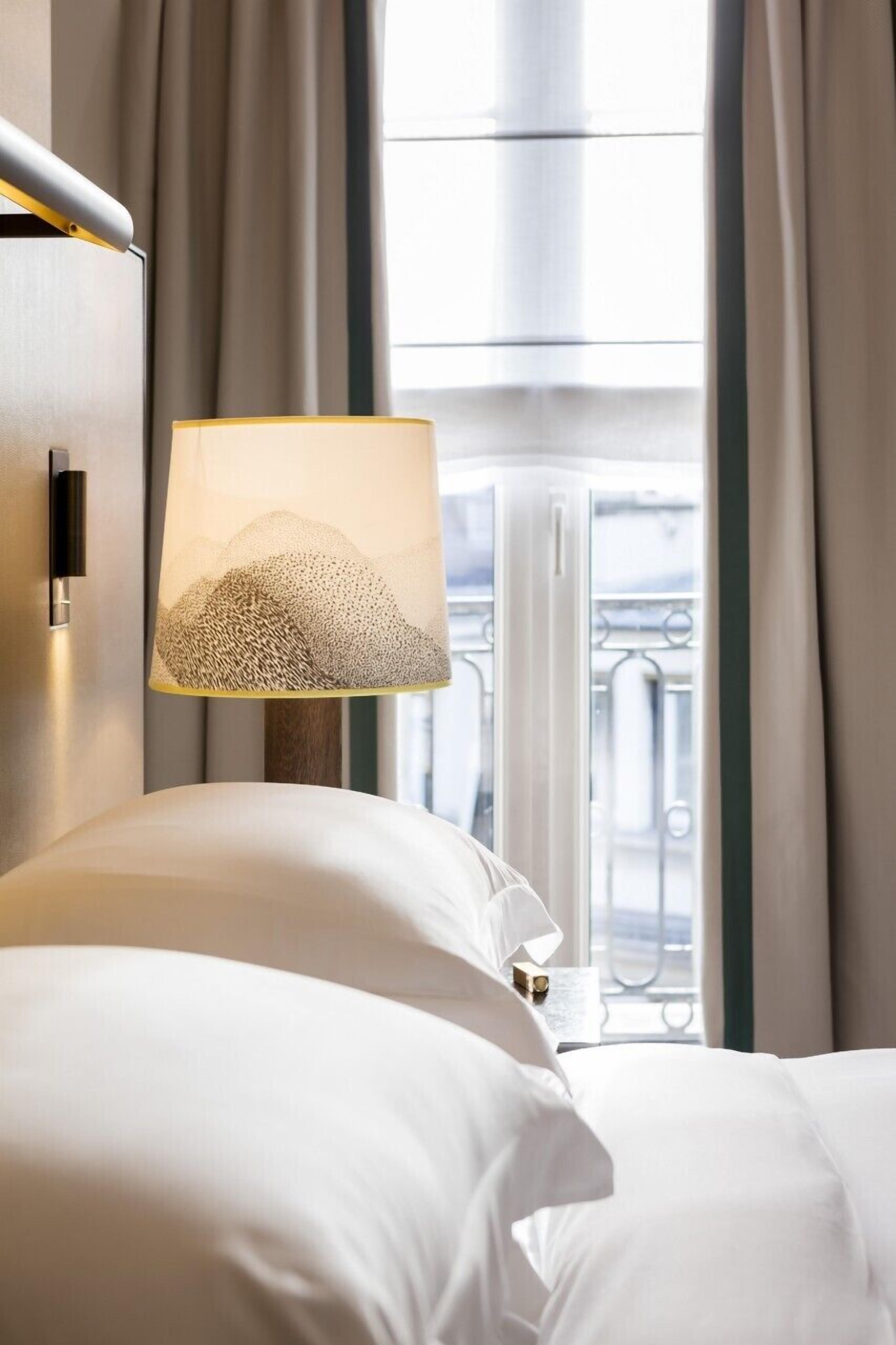 deluxe room, 1 king bed | premium bedding, minibar, in-room safe, individually decorated