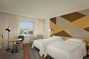 Premium bedding, down comforters, in-room safe, laptop workspace