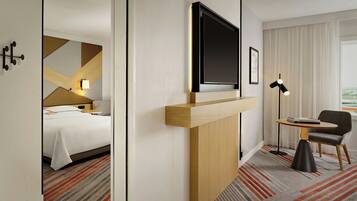 Family Room, Multiple Beds | Premium bedding, down comforters, in-room safe, laptop workspace