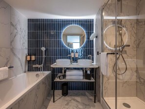 Eco-friendly toiletries, hair dryer, towels, soap