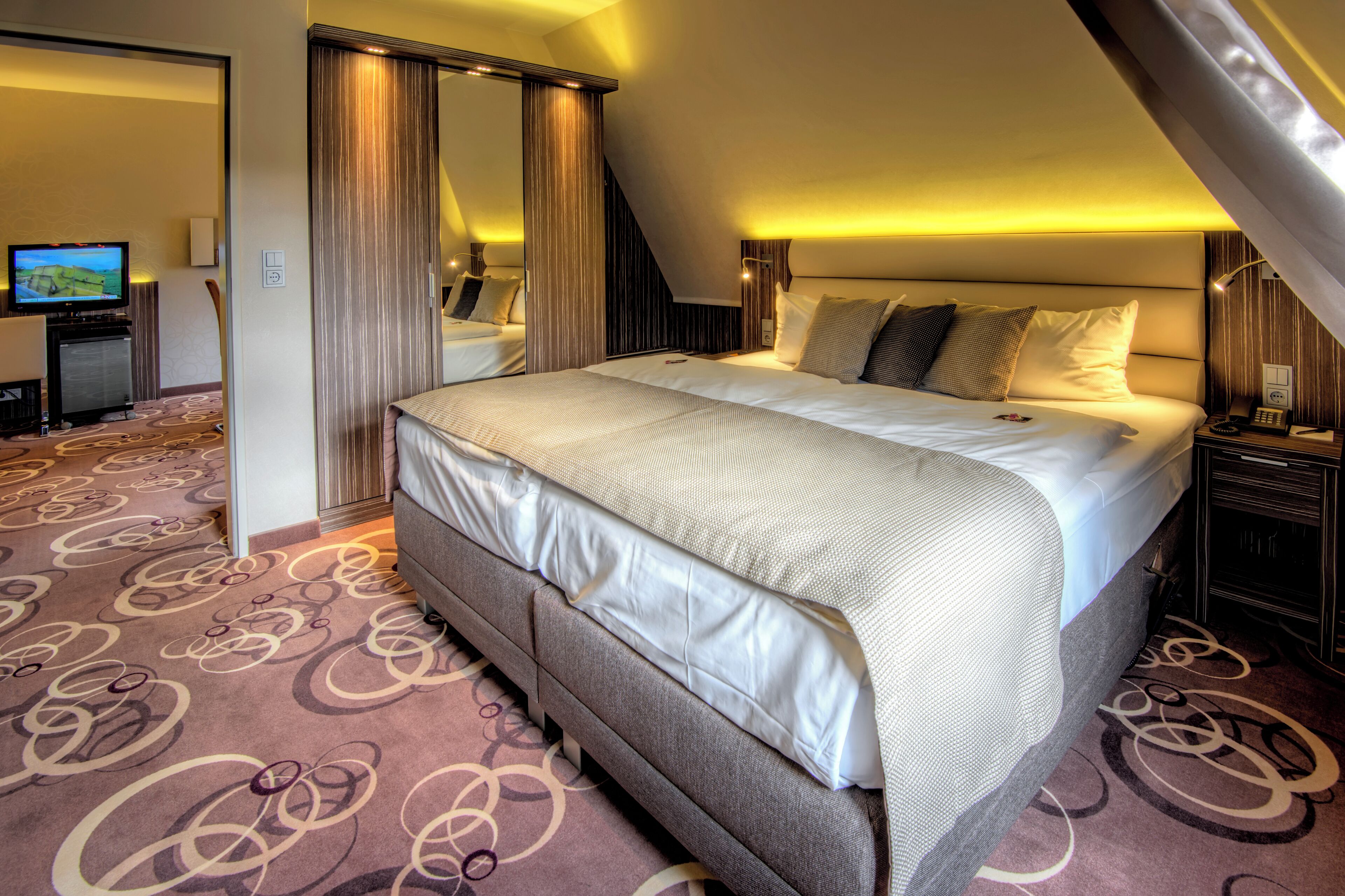 Ropa de cama de alta calidad y minibar 