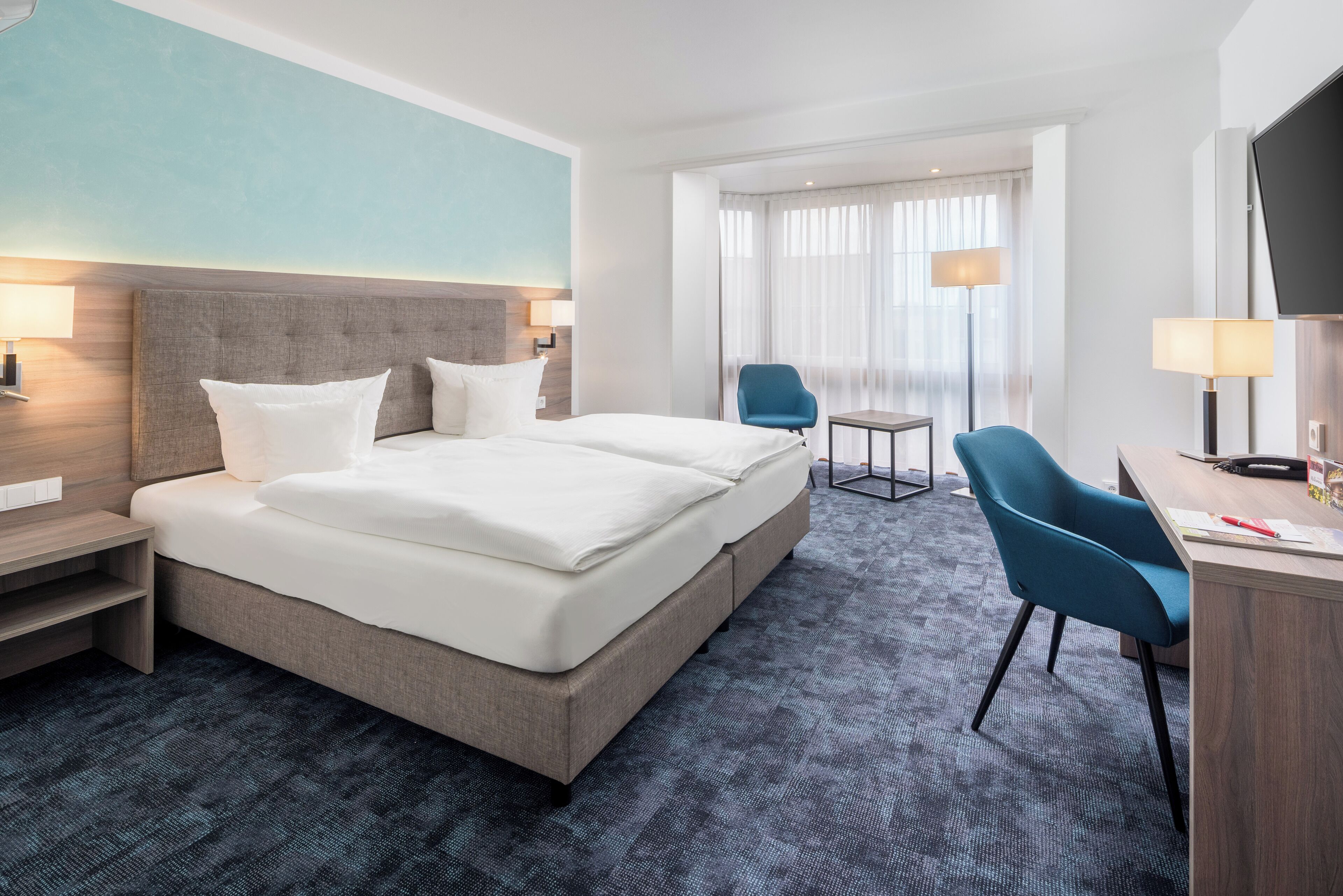 Comfort Double or Twin Room | Down comforters, minibar, in-room safe, individually furnished