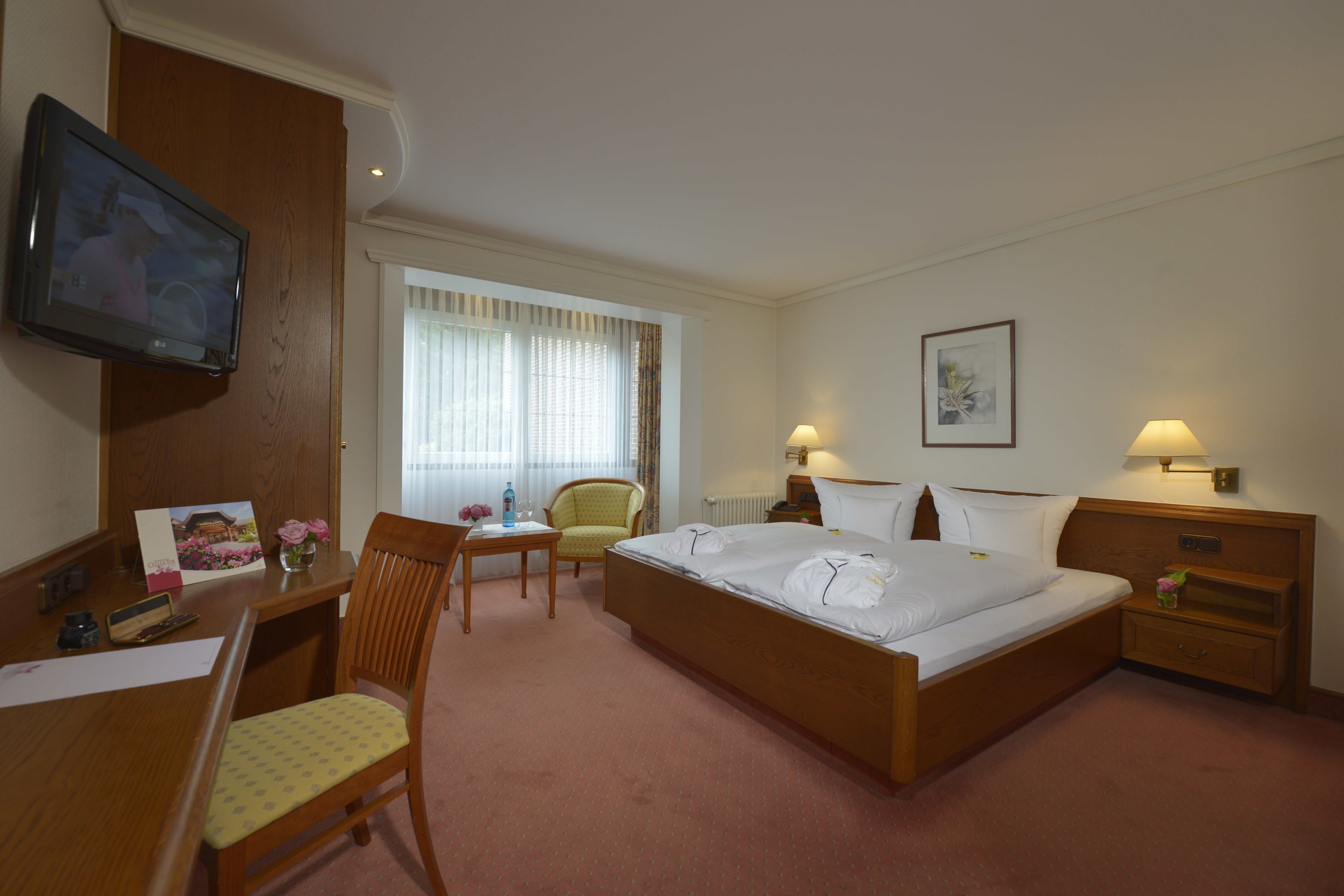 Cobrellits, minibar, caixa forta a l'habitació i mobiliari individual 