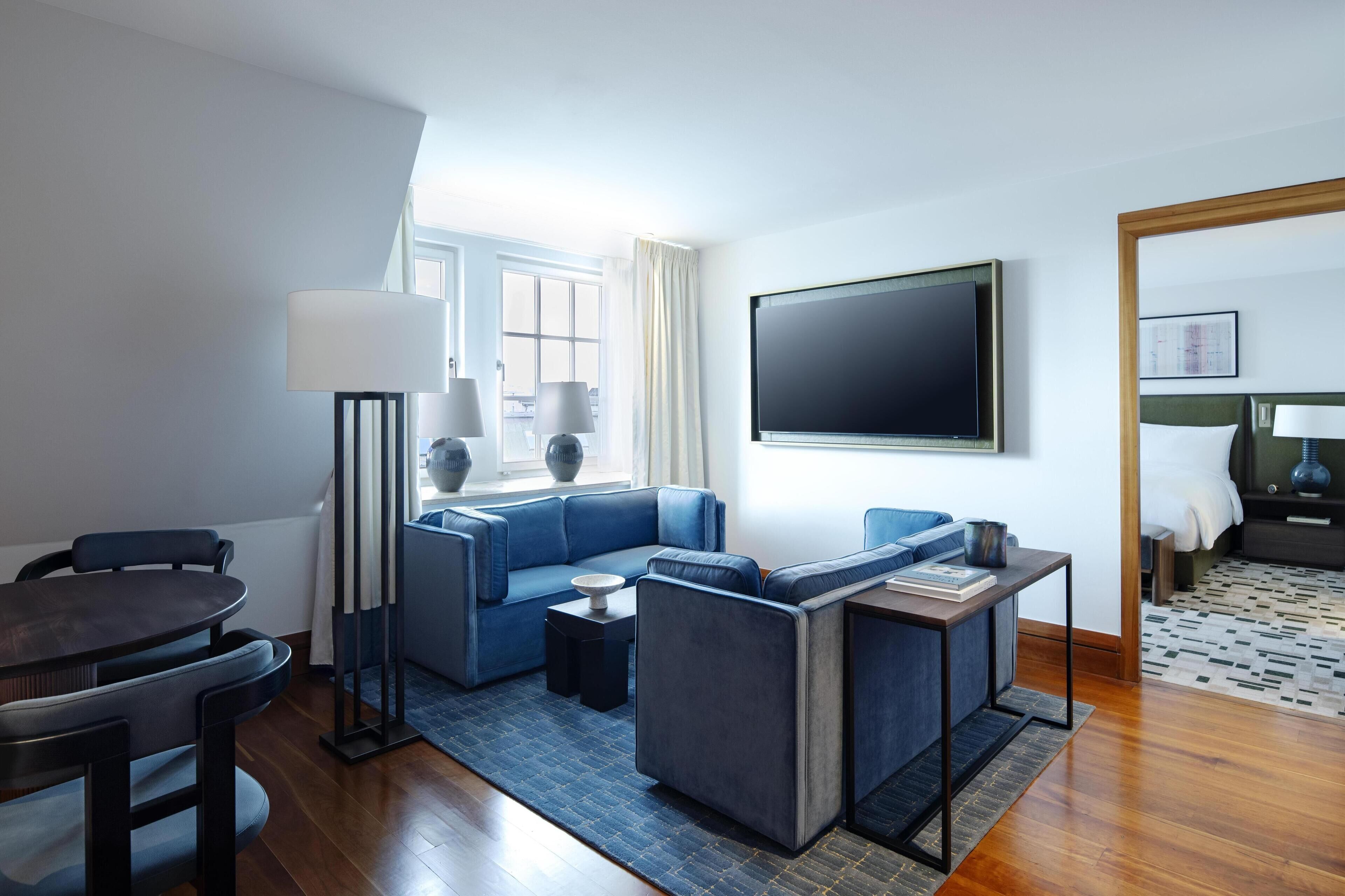 Deluxe Studio, 1 King Bed | Living area | Flat-screen TV, pay movies, MP3 dock