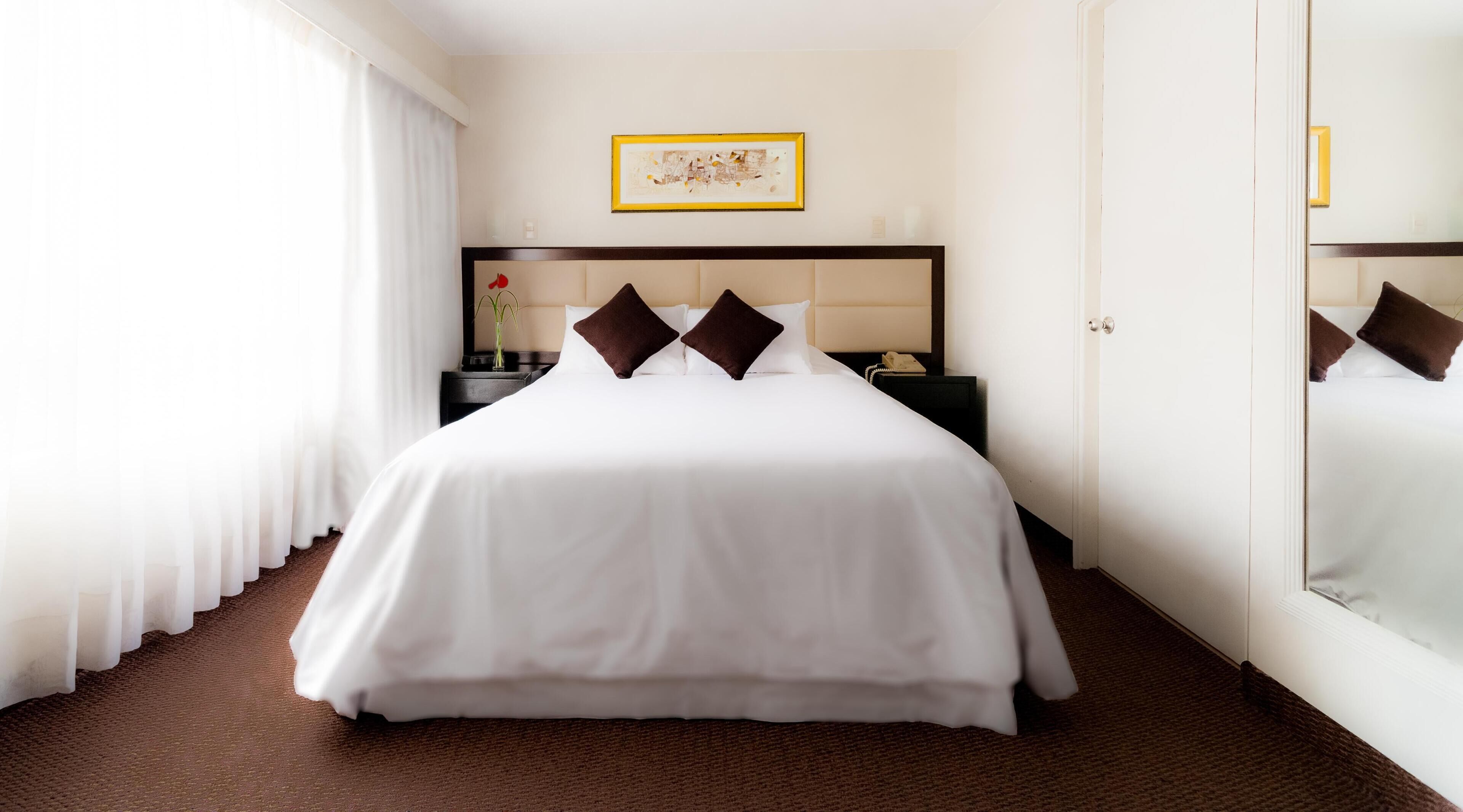 Hochwertige Bettwaren, Daunenbettdecken, Minibar, Zimmersafe