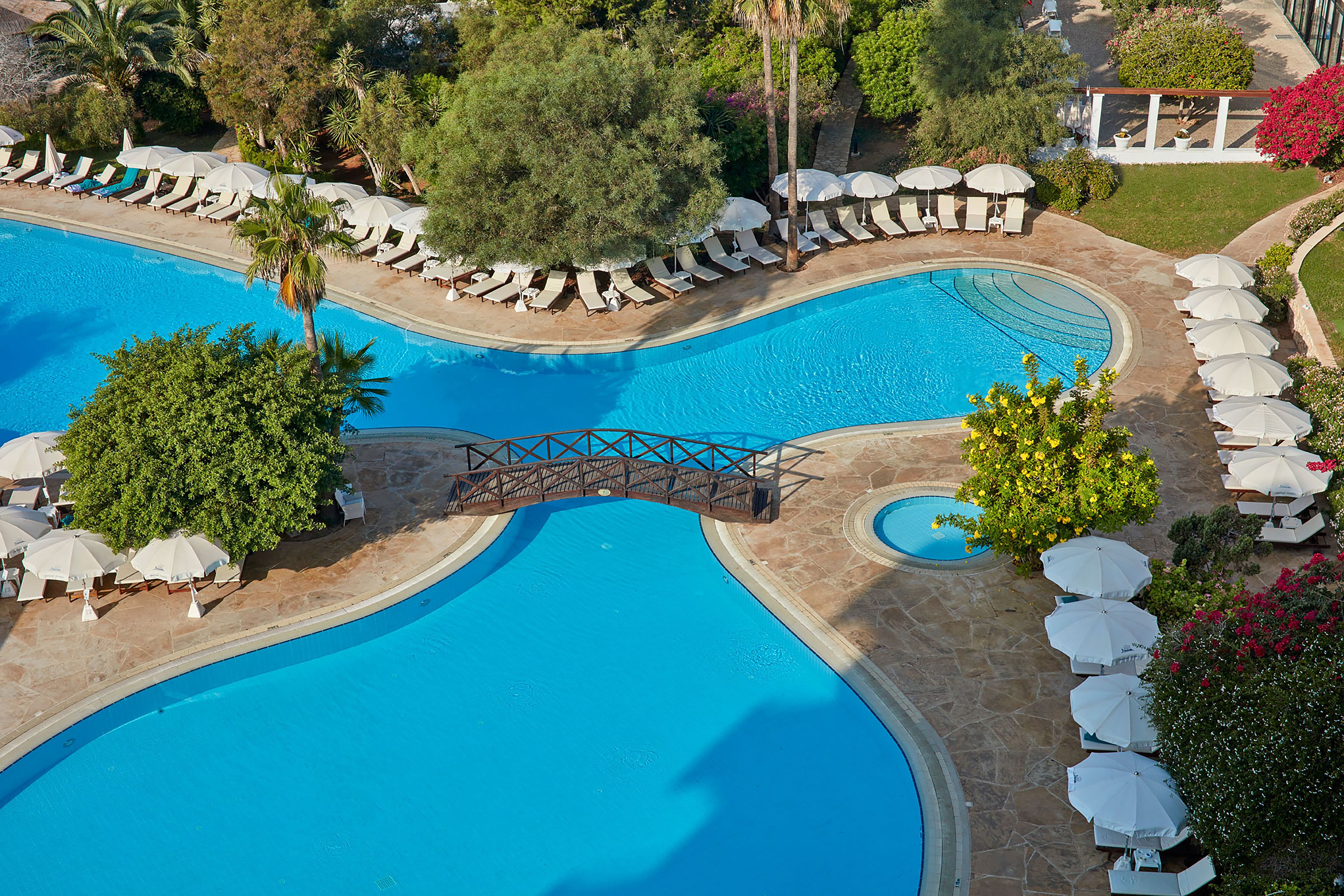 Indoor pool, outdoor pool, open 8:00 AM to 6:00 PM, pool umbrellas