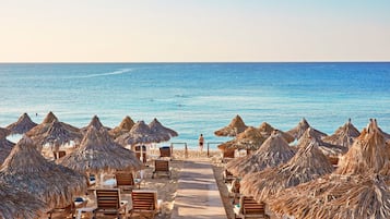 Private beach, sun loungers, beach umbrellas, beach towels