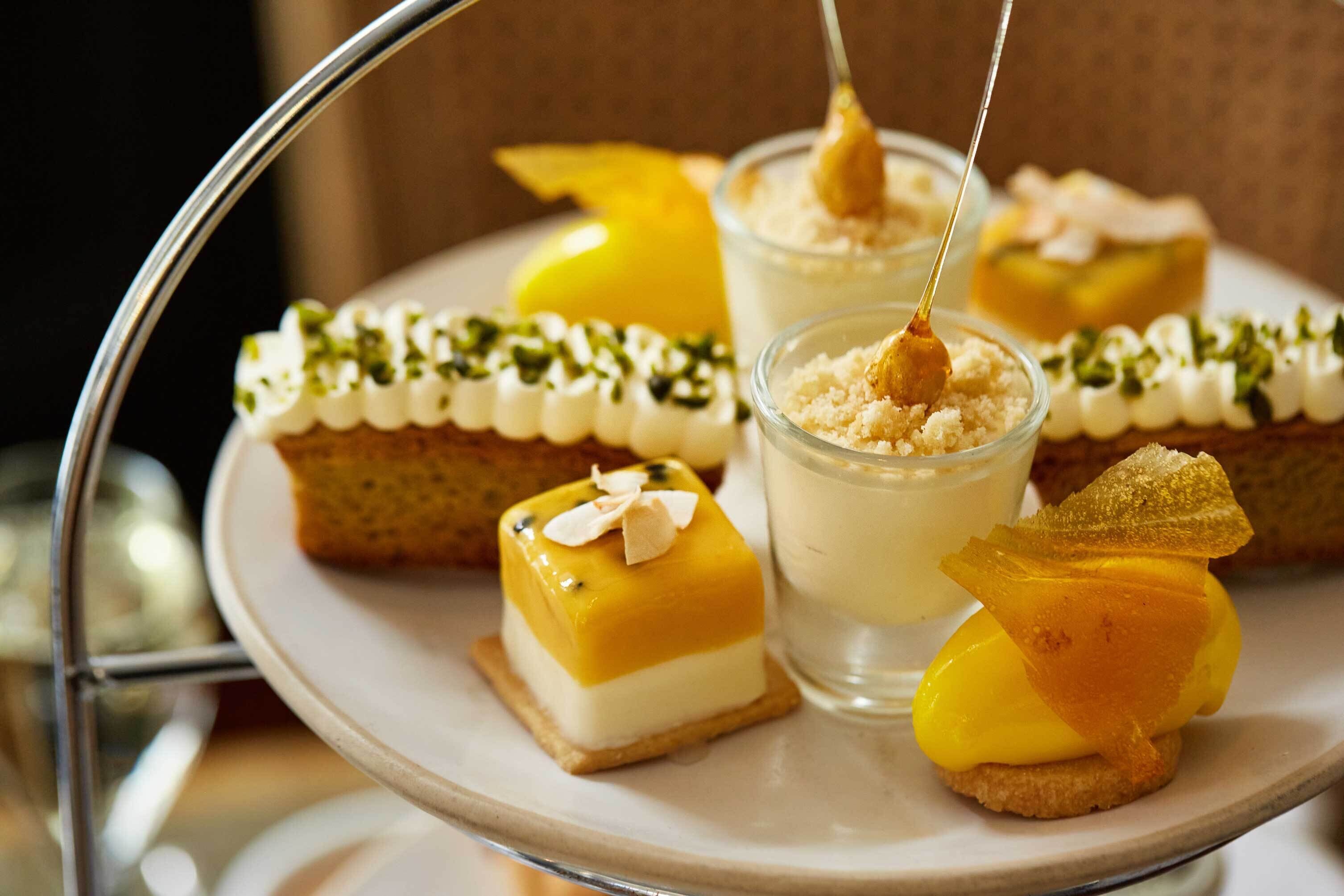 A dessert tray with various sweet treats.