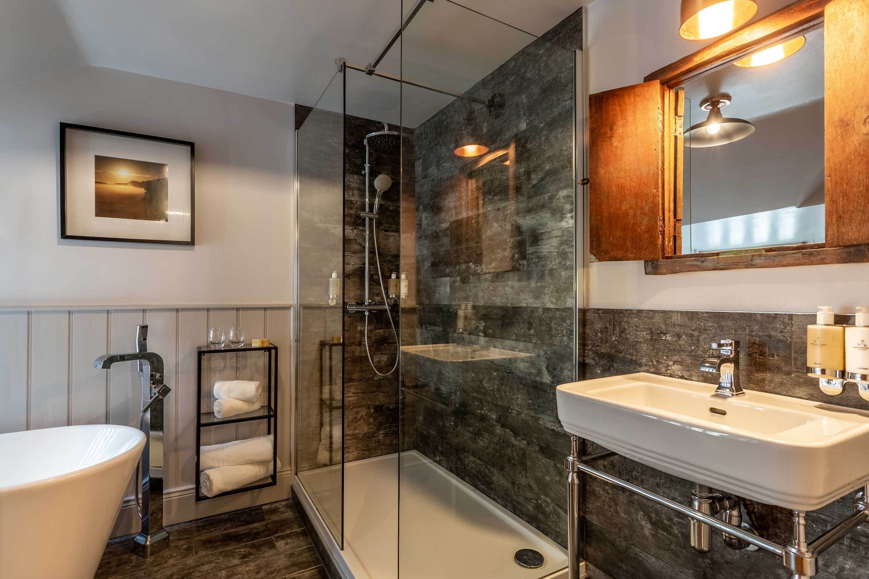 superior double room | bathroom | free toiletries, hair dryer, towels