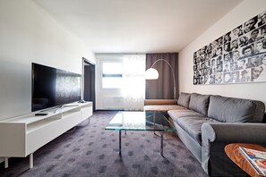 Executive Apartment | Living area | Flat-screen TV