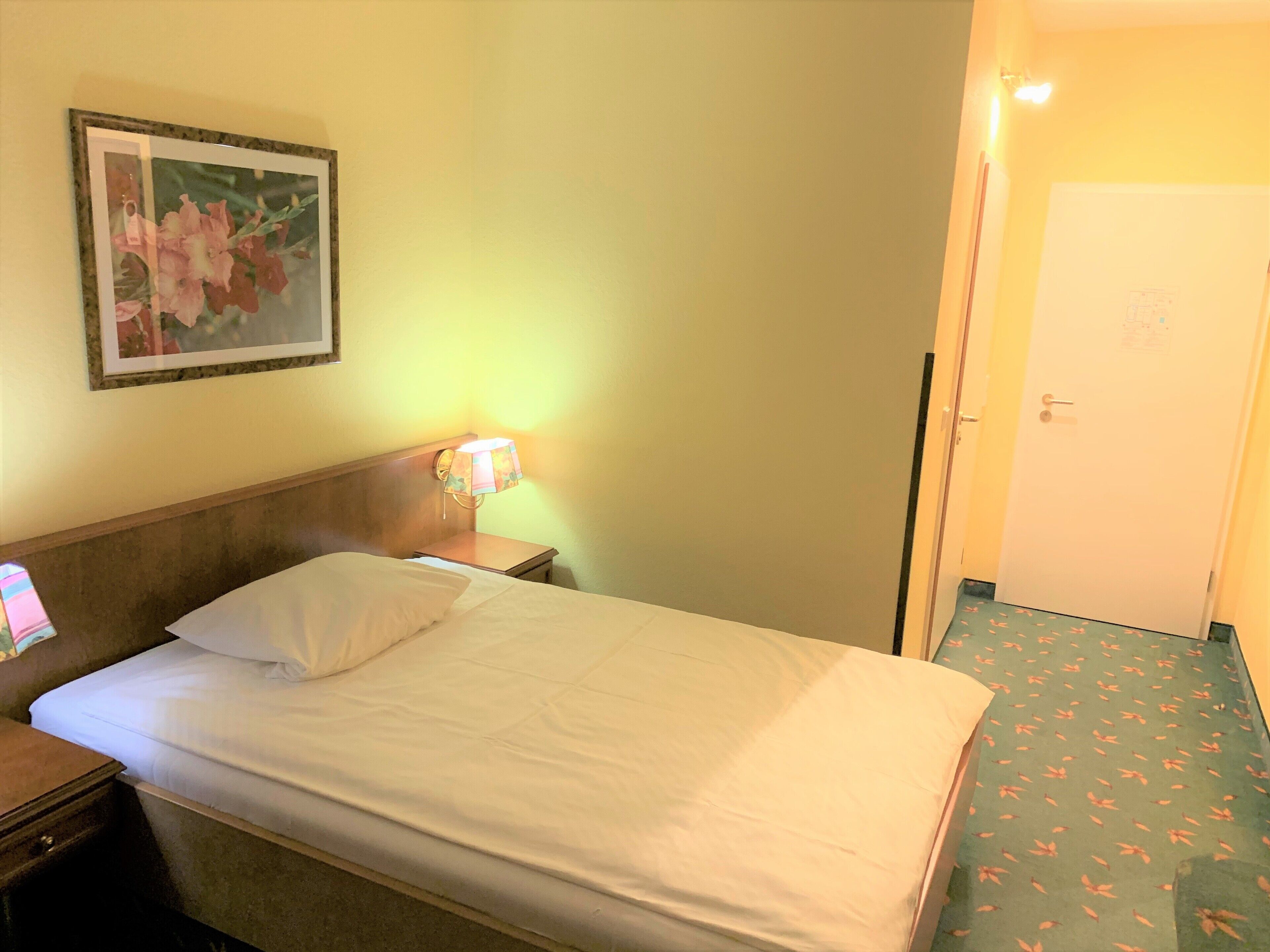 single room | desk, laptop workspace, blackout curtains, iron/ironing board