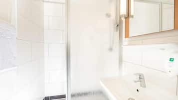 Shower, eco-friendly toiletries, hair dryer, towels