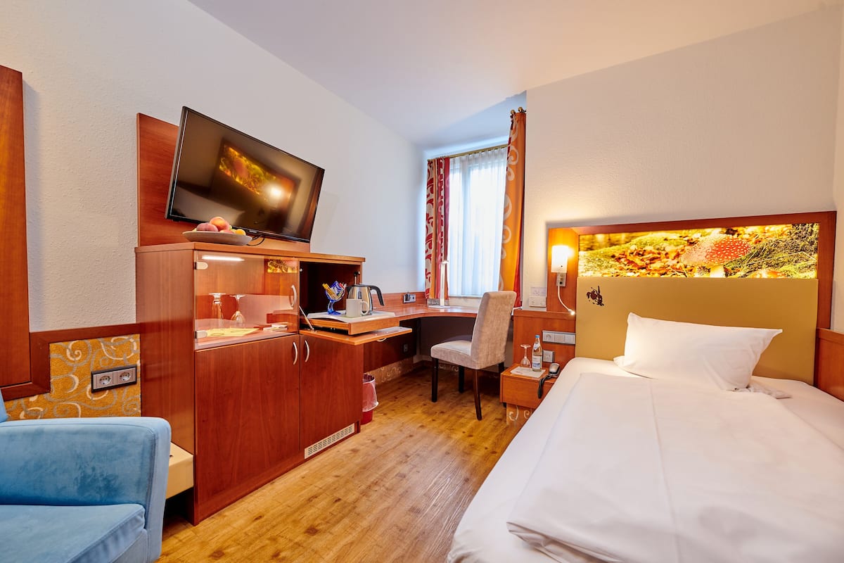 Chambre Simple Affaires | Literie hypoallergénique, minibar, coffres-forts dans les chambres