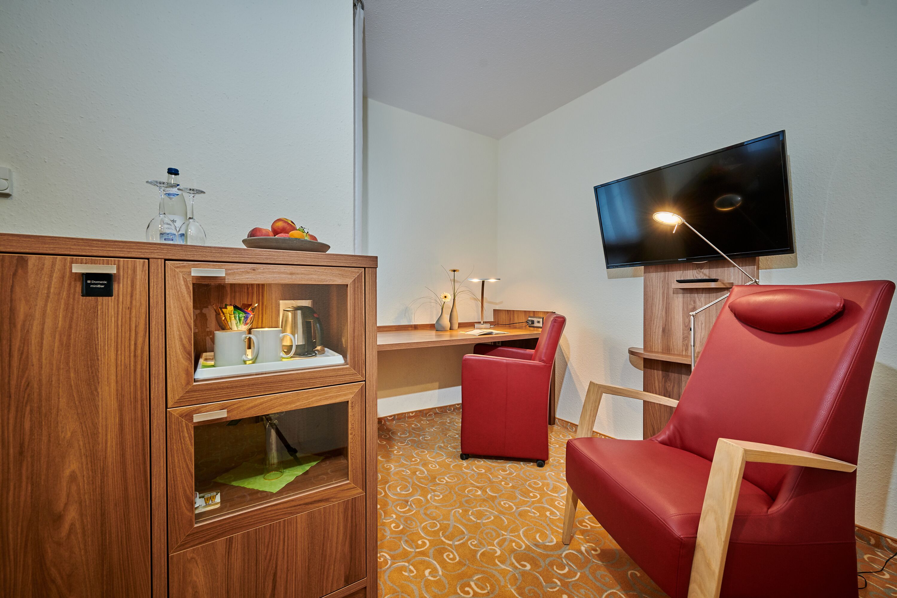 comfort double room | living area | flat-screen tv