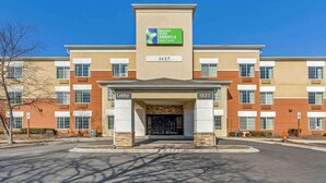 A hotel entrance with a sign for Extended Stay America Select Suites, number 1827, and a lobby area. - Extended Stay America Select Suites Chicago Naperville East (Naperville)