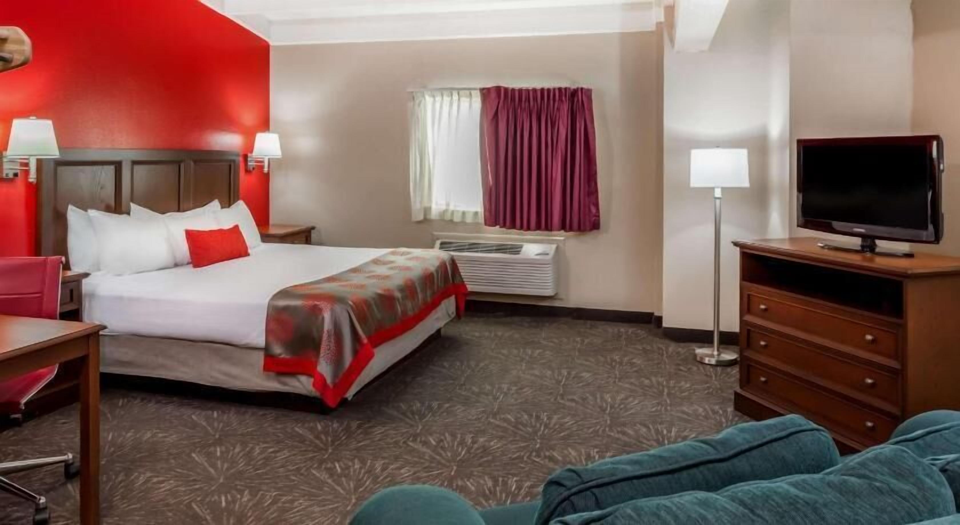 Premium bedding, desk, blackout drapes, iron/ironing board