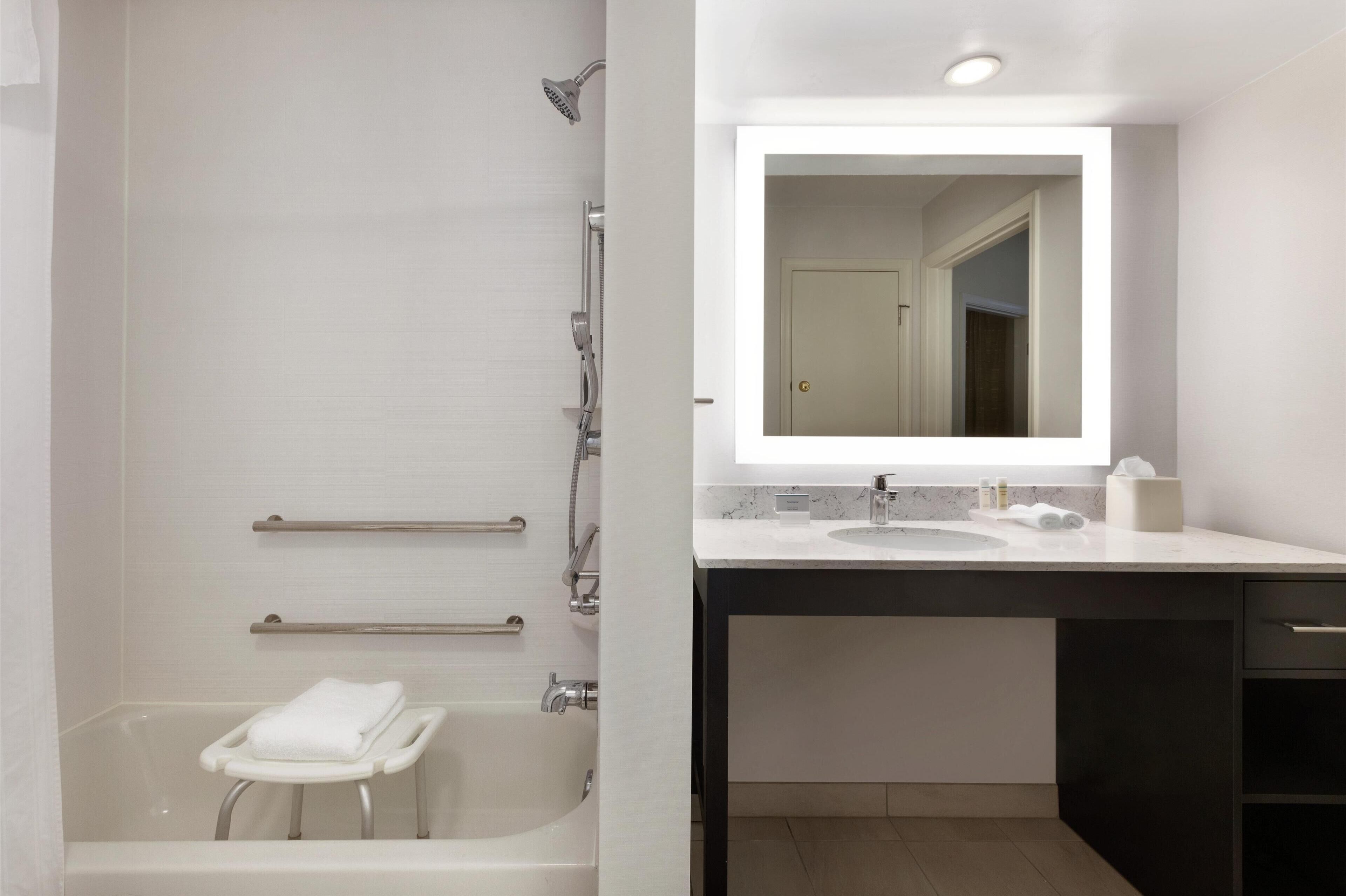 suite, 1 king bed, bathtub | bathroom | shower, free toiletries, hair dryer, towels