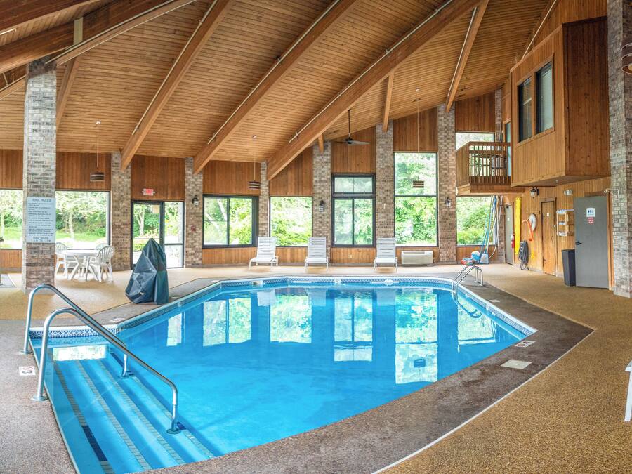 Indoor pool, open 9:00 AM to 9:00 PM, pool loungers