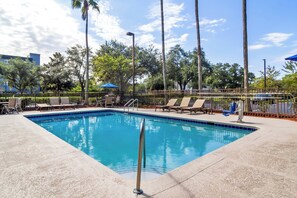 Outdoor pool, open 9:00 AM to 7:00 PM, pool umbrellas, sun loungers