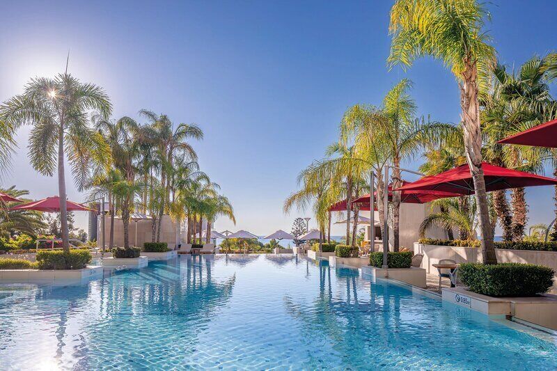 Indoor pool, seasonal outdoor pool, pool umbrellas, pool loungers