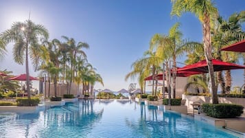 Indoor pool, seasonal outdoor pool, pool umbrellas, pool loungers