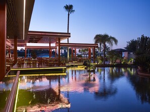 Indoor pool, seasonal outdoor pool, pool umbrellas, pool loungers