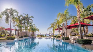 Indoor pool, seasonal outdoor pool, pool umbrellas, sun loungers