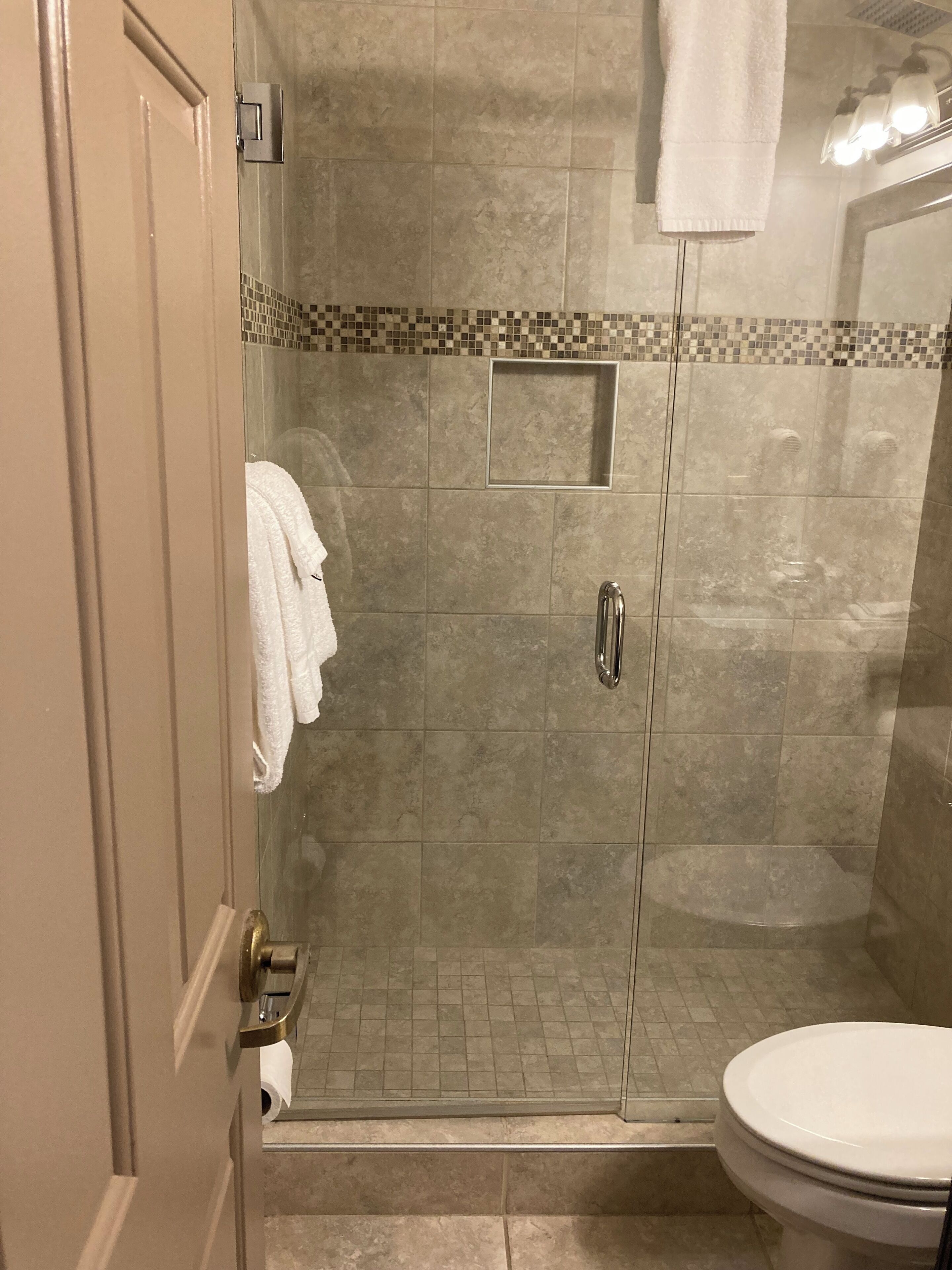 shower, rainfall showerhead, designer toiletries, hair dryer