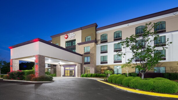 A hotel with a modern design, featuring a prominent entrance with a covered area and a clear sign indicating it is a Best Western property. - Best Western Plus Birmingham Inn & Suites (Birmingham)