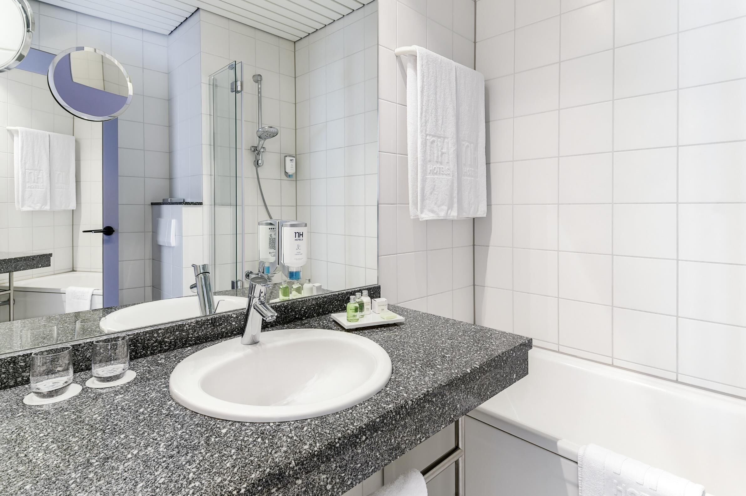 superior double room | bathroom | eco-friendly toiletries, hair dryer, towels