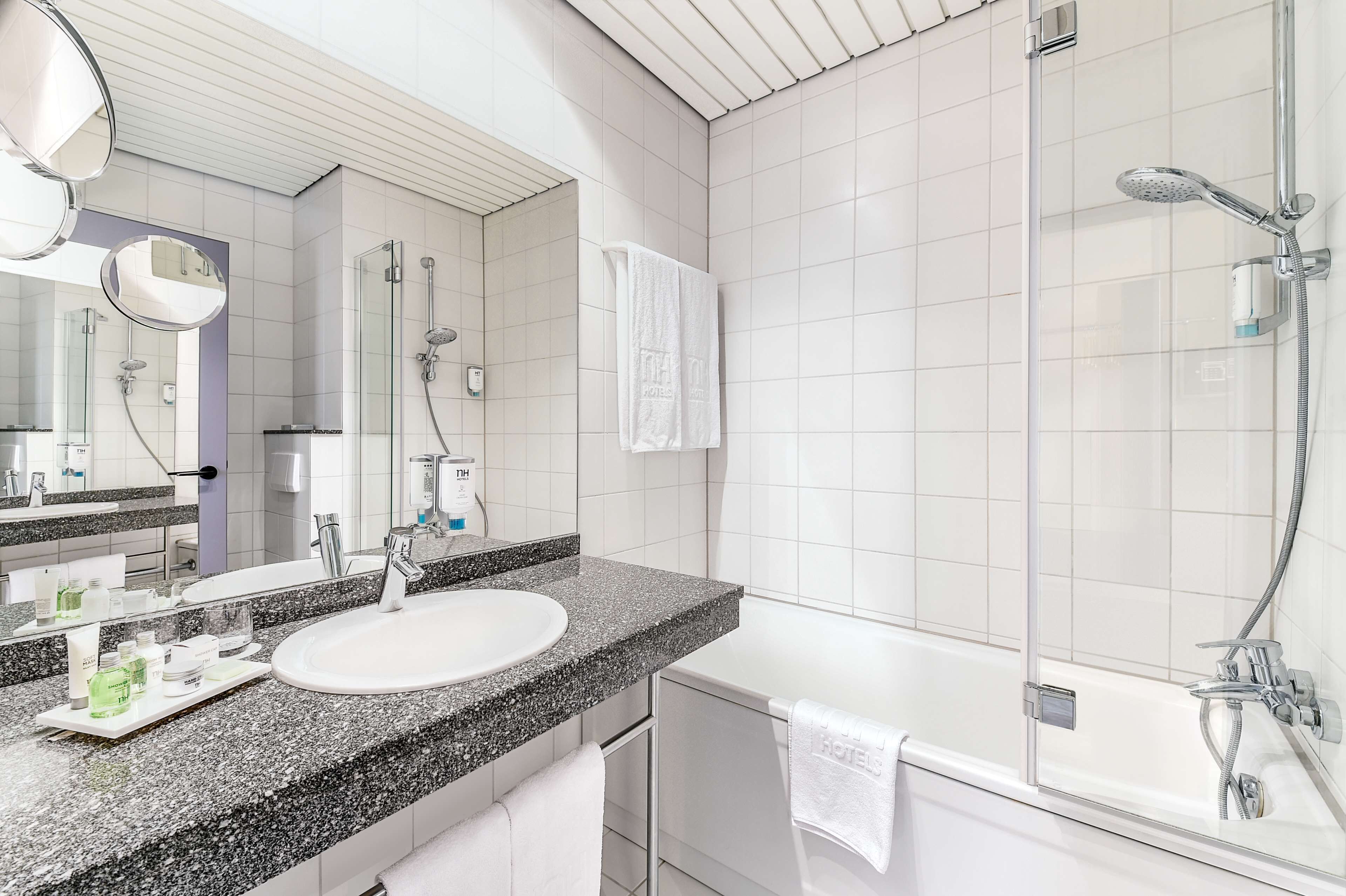 eco-friendly toiletries, hair dryer, towels