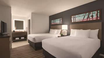 Suite Deluxe, 2 habitaciones | Colchones con acolchado adicional, caja fuerte, escritorio