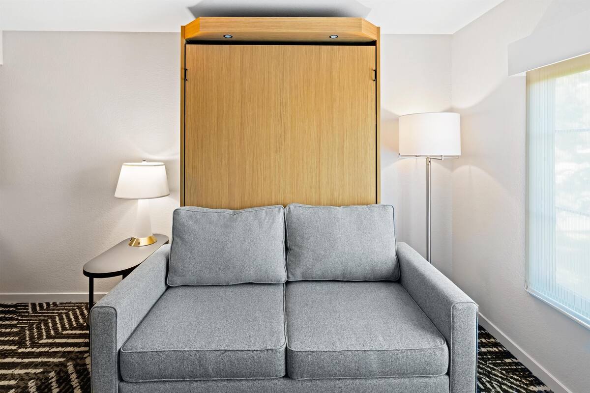 Suite, 1 Bedroom (King and Murphy Bed) | Pillowtop beds, in-room safe, desk, blackout drapes