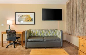 Desk, laptop workspace, blackout drapes, iron/ironing board