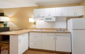 Desk, laptop workspace, blackout curtains, iron/ironing board