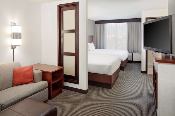 Premium bedding, pillowtop beds, desk, laptop workspace