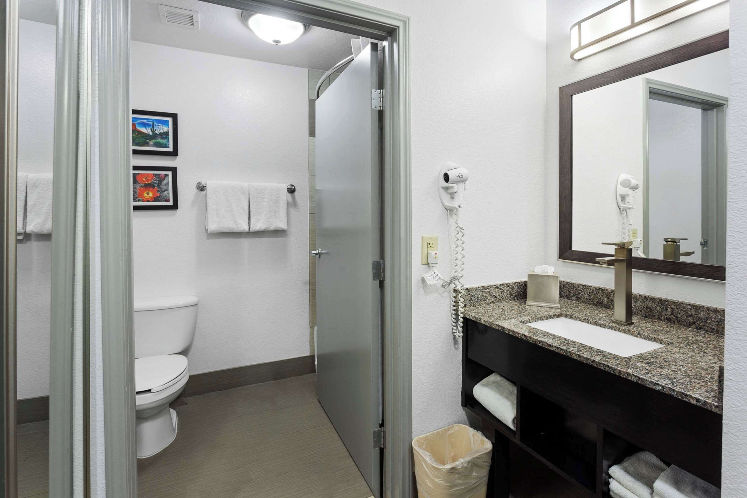 premium bedding, pillow-top beds, desk, blackout curtains