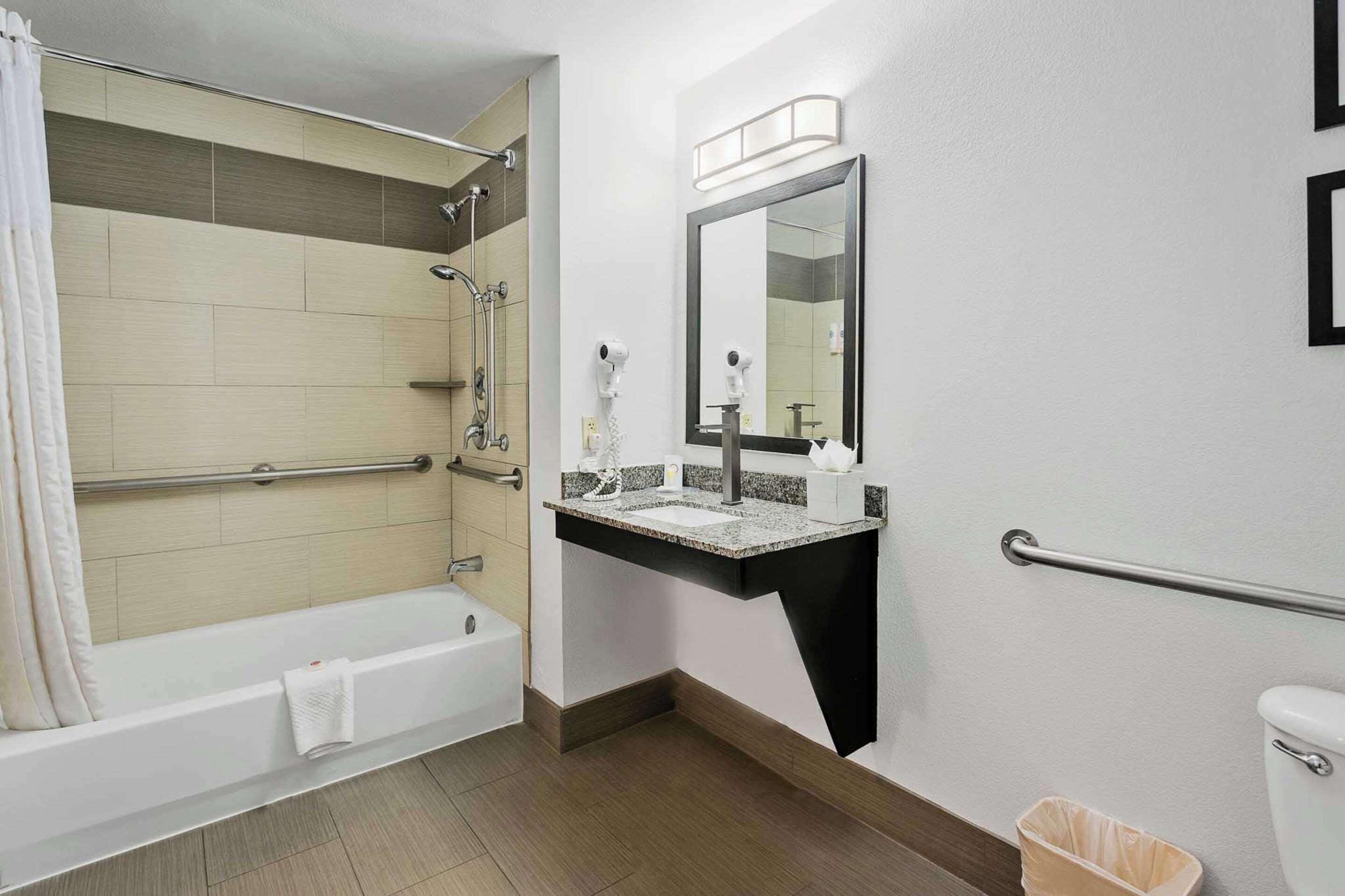 premium bedding, pillow-top beds, desk, blackout curtains