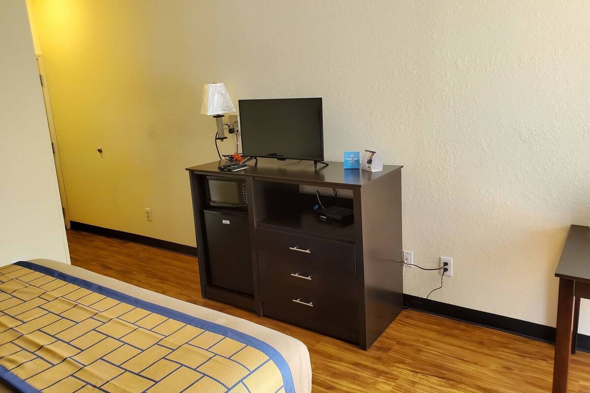 Blackout drapes, soundproofing, iron/ironing board
