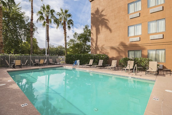 Outdoor pool, open 9:00 AM to 9:00 PM, pool umbrellas, sun loungers