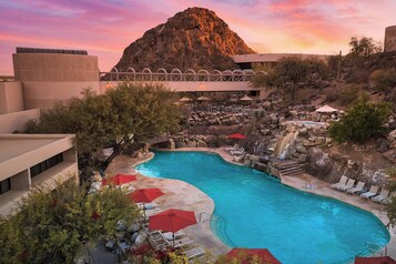 2 outdoor pools, open 7:00 AM to 9:00 PM, pool umbrellas, sun loungers