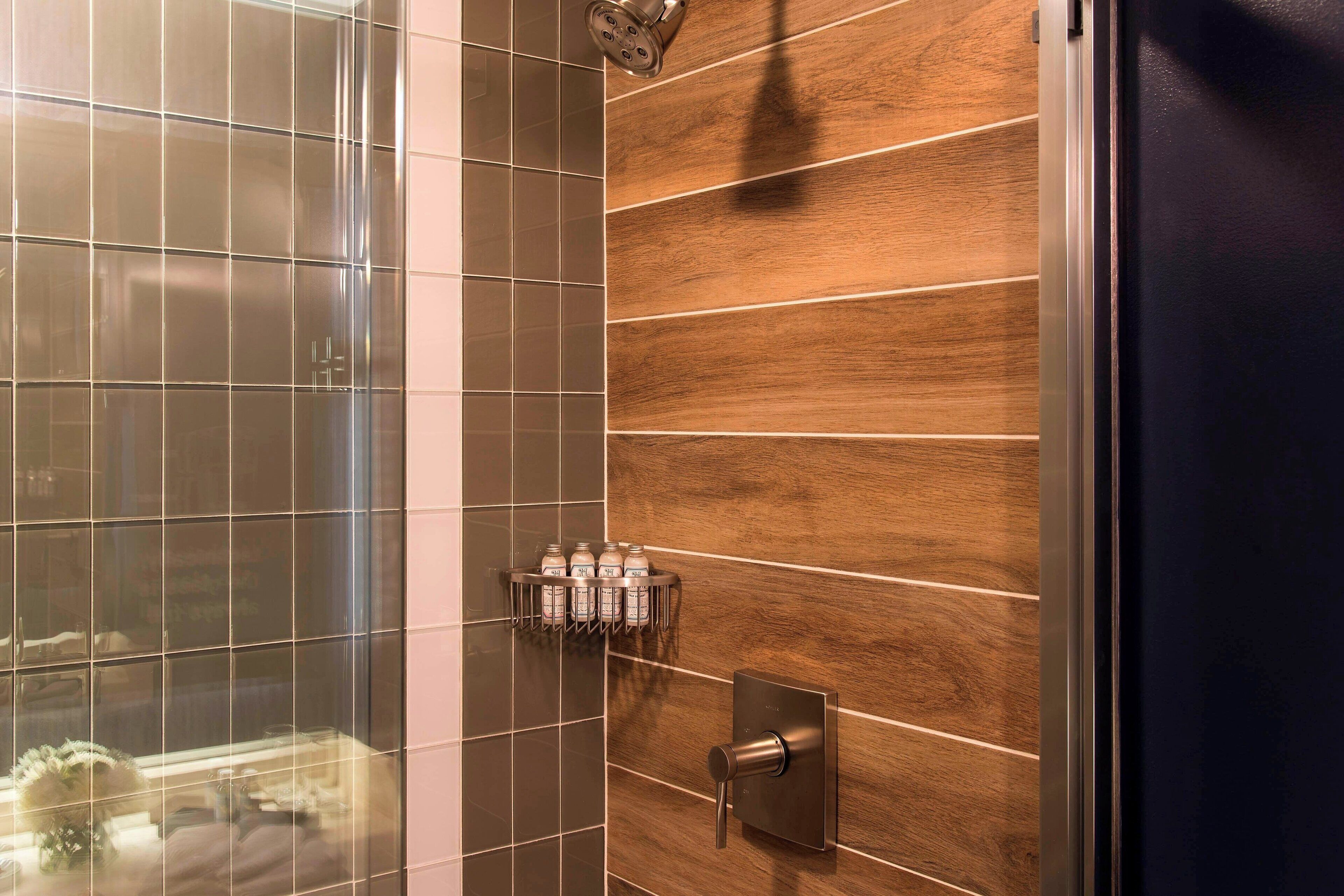 designer toiletries, hair dryer, towels