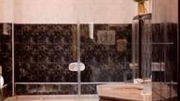Executive Suite, Jetted Tub | Bathroom | Hair dryer