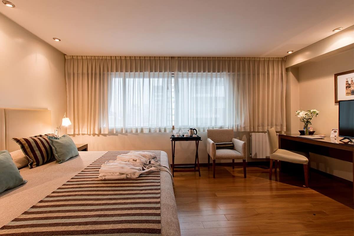 superior room, 1 queen bed | minibar, in-room safe, individually furnished, desk