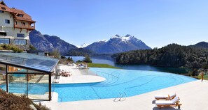 Indoor pool, outdoor pool, pool umbrellas