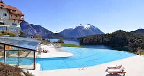 Indoor pool, outdoor pool, pool umbrellas