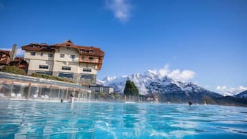 Indoor pool, outdoor pool, pool umbrellas