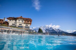 Indoor pool, outdoor pool, pool umbrellas