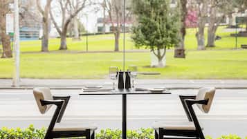 Breakfast, dinner served; local cuisine, garden views